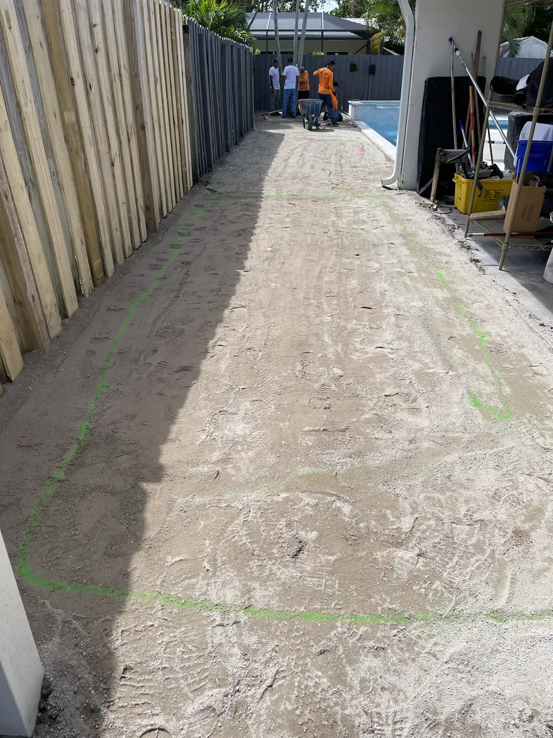 Before: the same side yard with a bare base